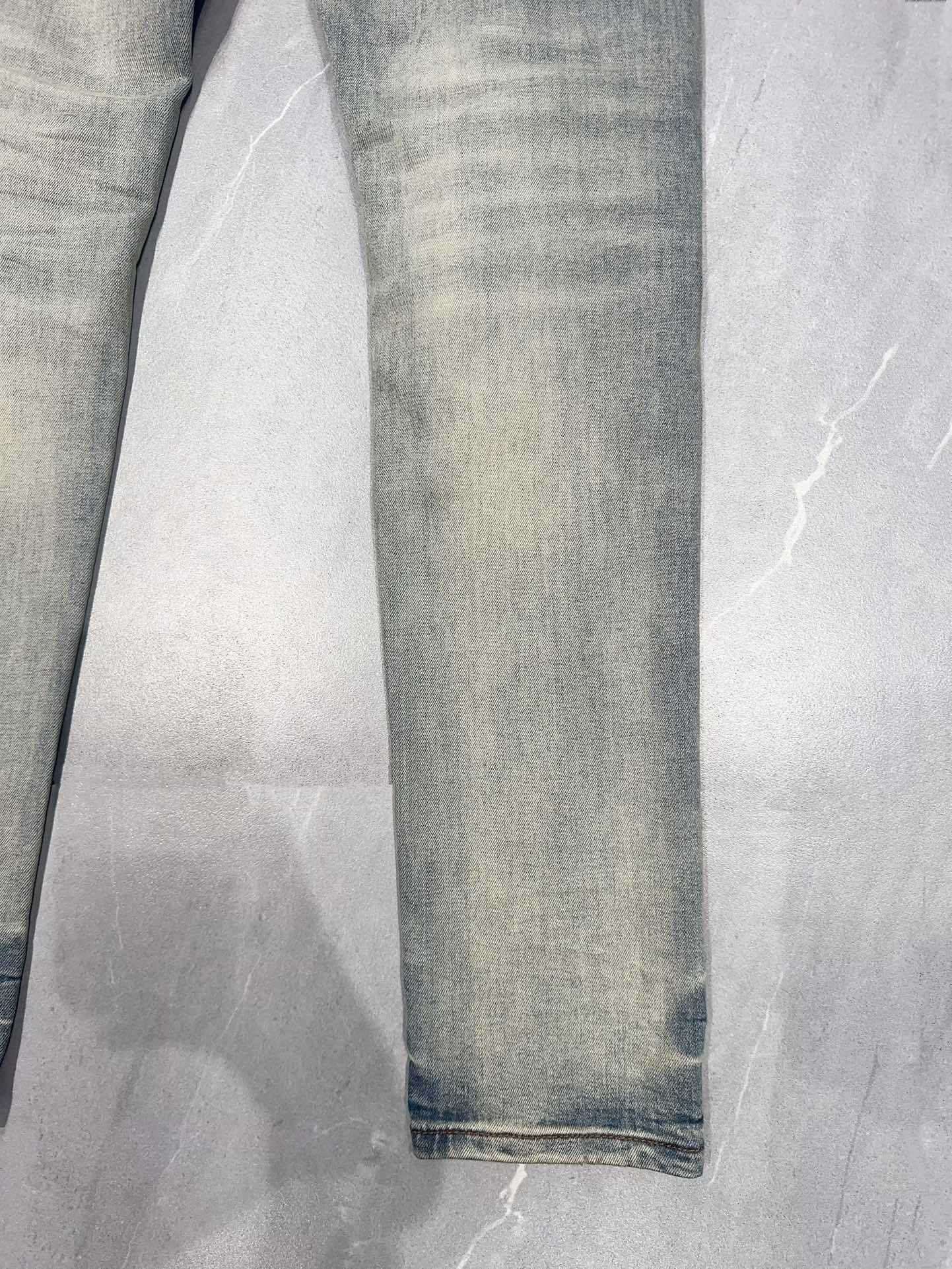 AMIRI MX1 RIPPED SKINNY JEANS