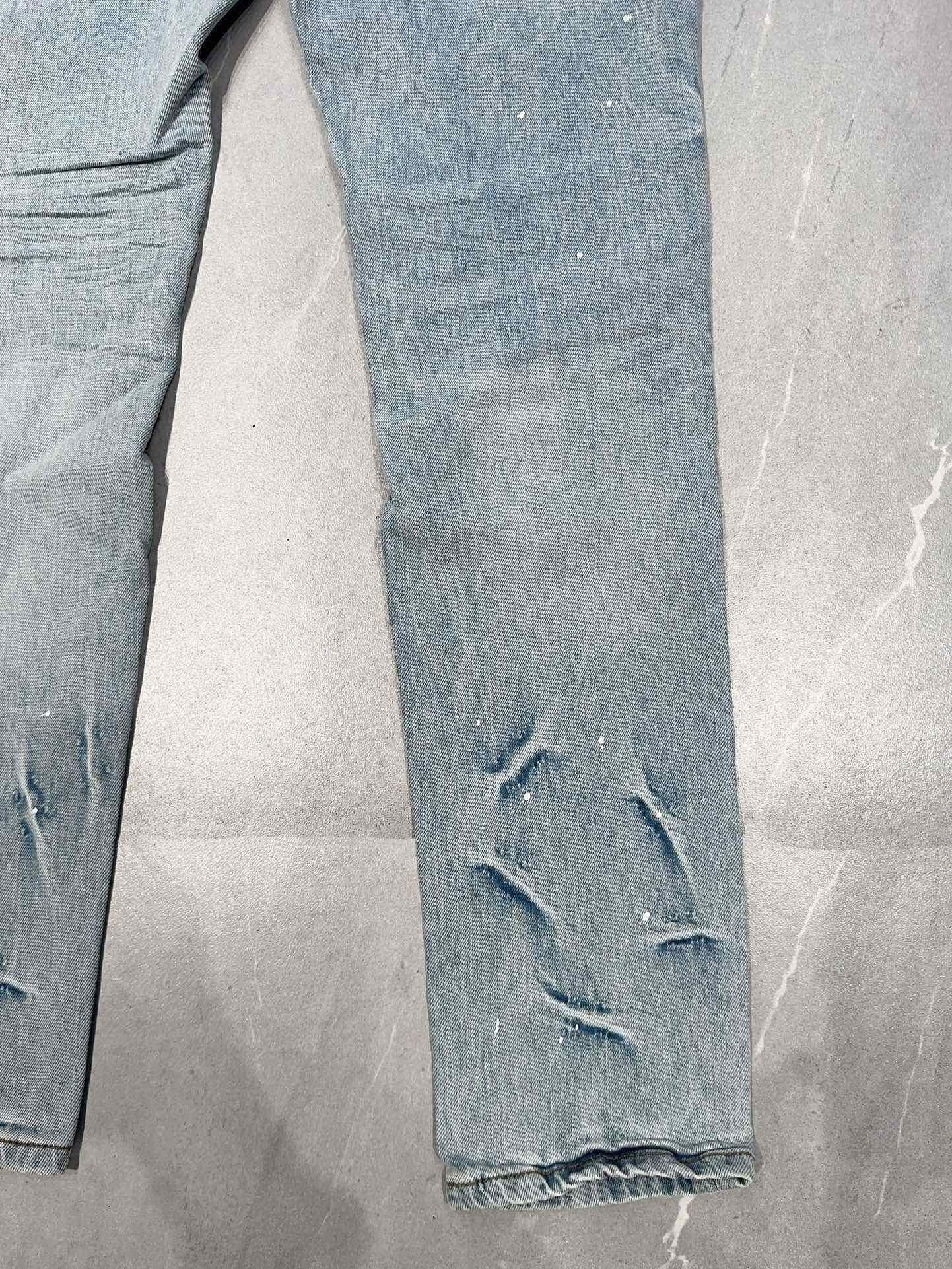 AMIRI DISTRESSED CEMENT CALIFORNIA SKINNY JEANS