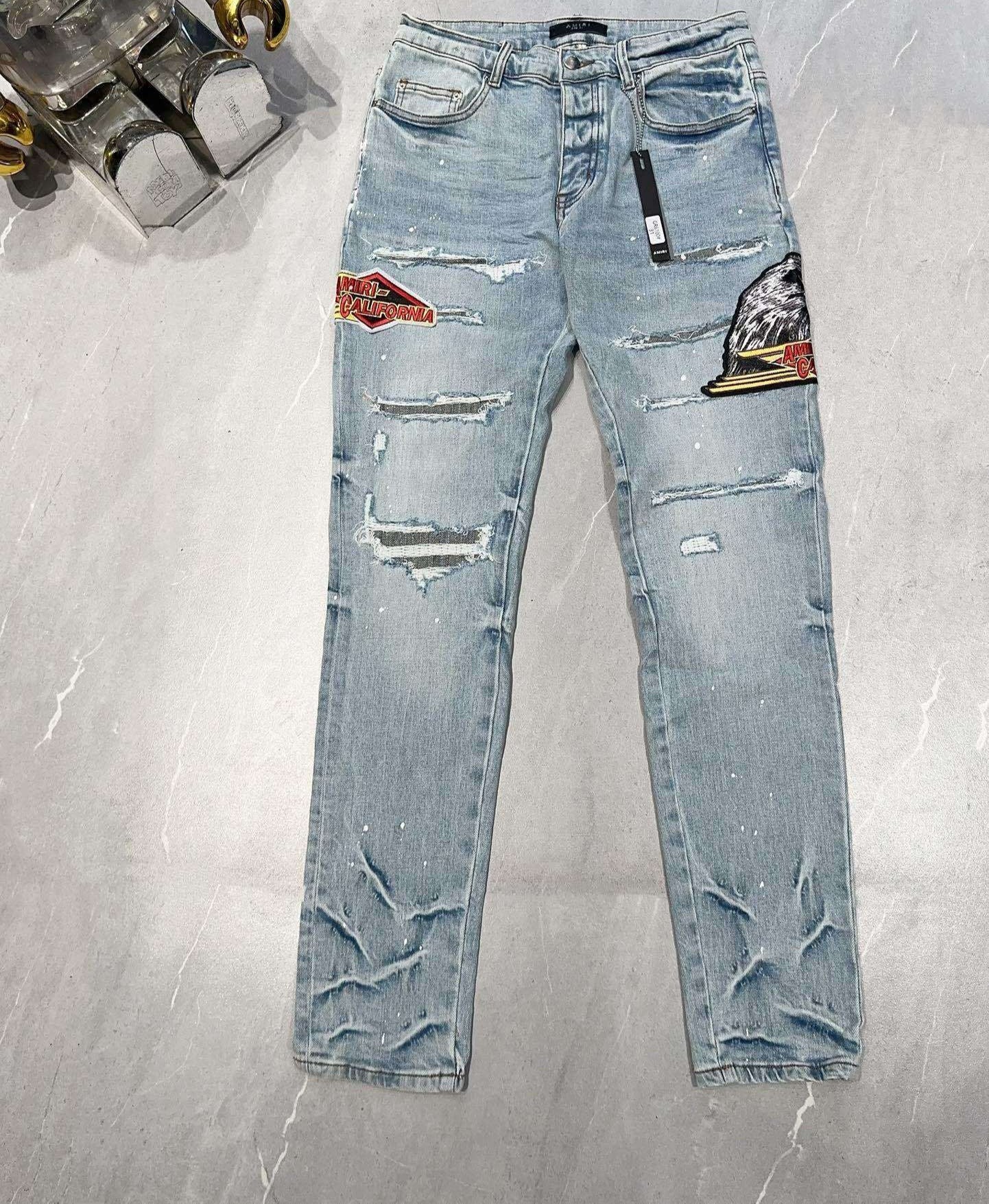 AMIRI DISTRESSED CEMENT CALIFORNIA SKINNY JEANS